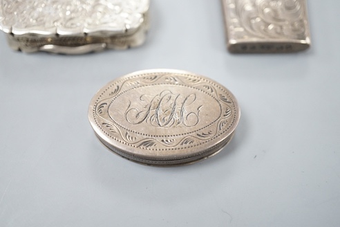 A George III silver oval patch box, John Taylor, Birmingham, 1800, 36mm, a Georgian silver concave combination snuff box/vinaigrette, Samuel Pemberton, Birmingham, 1809?, a Victorian silver pill box and a similar silver